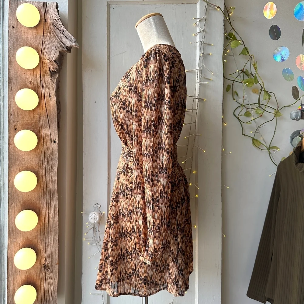 Black Tape_ Brown and Tan Patterned Garment
